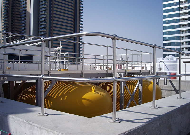 Polished stainless steel handrails around surge vessels to Qatar Pumping Station Polished stainless steel handrails around surge vessels to Qatar Pumping Station